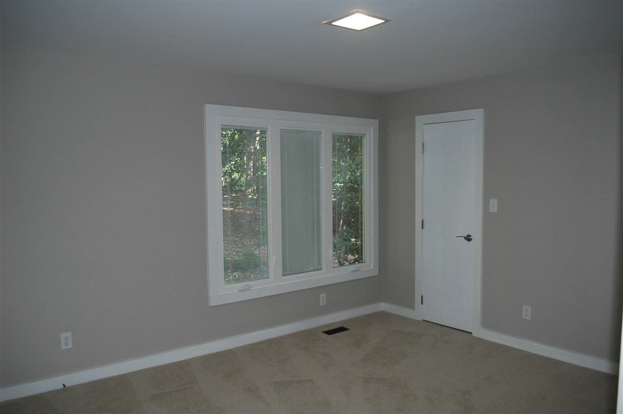 2012 Countrywood Road North Raleigh, NC 27615 - Photo 10 of 18 Second bedroom with new carpet, walk-in closet and adjacent full bathroom. Bedroom