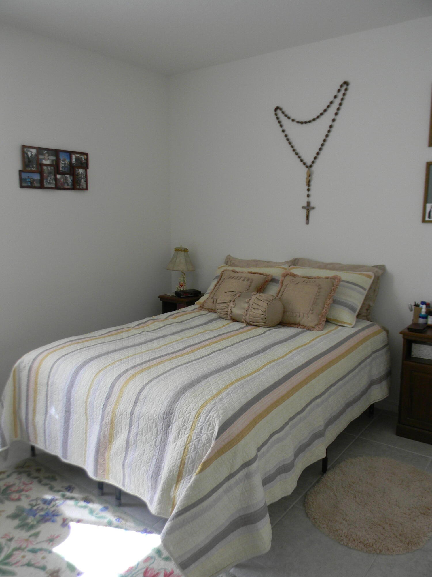 1588 Ranger Road Southeast Palm Bay, FL 32909 - Photo 20 of 52 a bedroom with a bed and a night stand