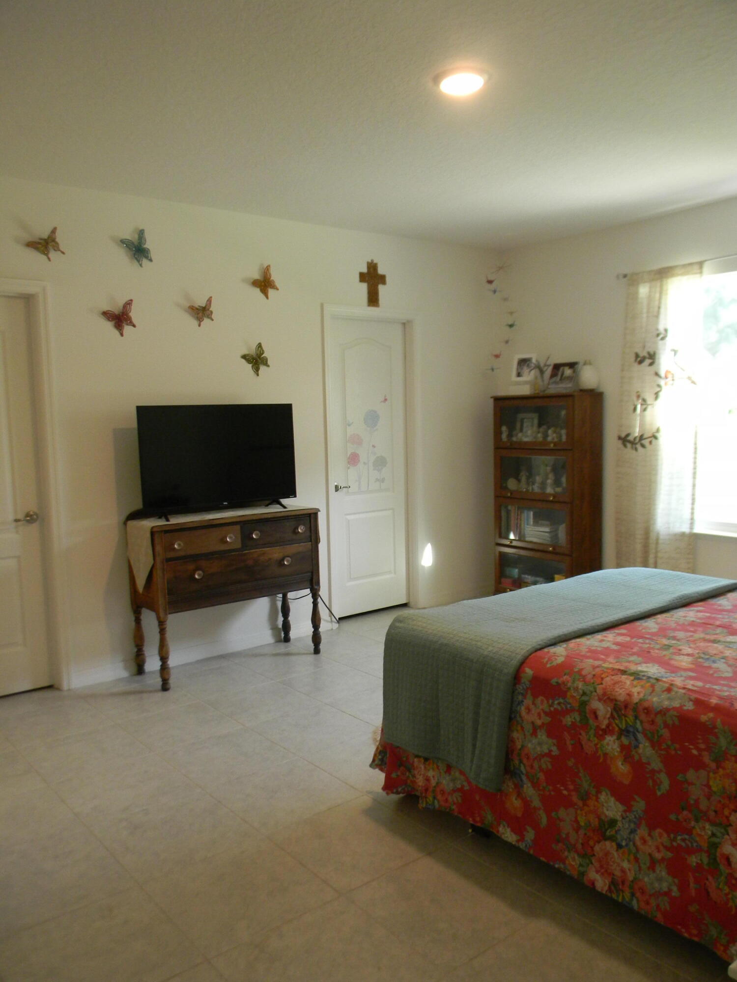 1588 Ranger Road Southeast Palm Bay, FL 32909 - Photo 28 of 52 a bedroom with a bed and a window