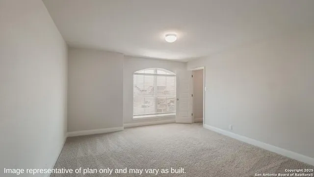 a view of hallway with windows