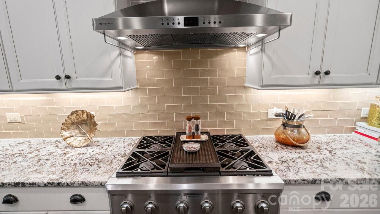 4854 Looking Glass Trail Denver, NC 28037 - Photo 12 of 48 a kitchen with a stove and cabinets
