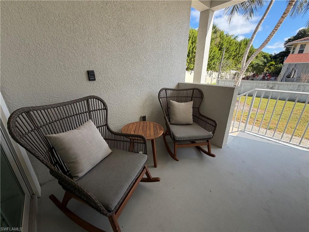 1727 Danford Street Naples, FL 34112 - Photo 15 of 15 a view of a two chair in the balcony
