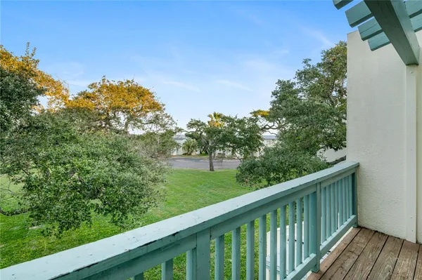 a balcony with an outdoor space