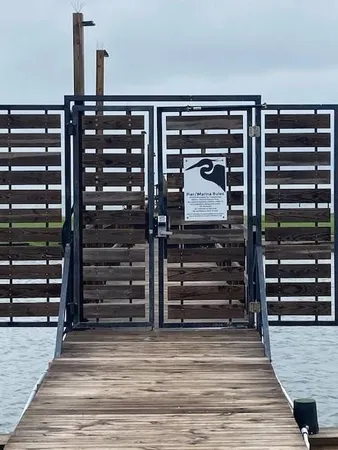 a view of a table and chairs in the garden