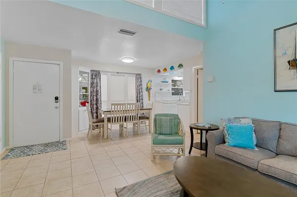 a living room with furniture and a table