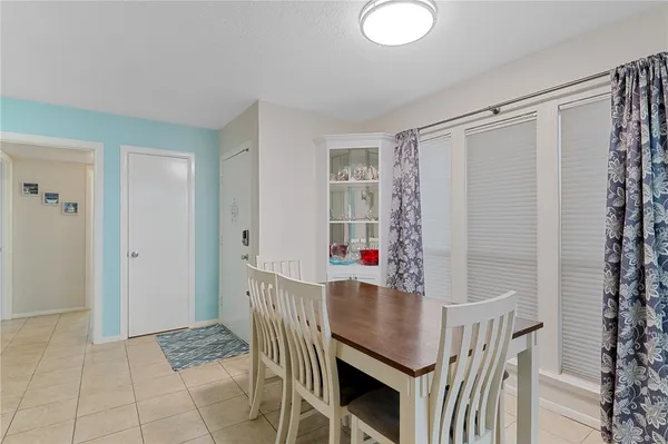 a view of a livingroom with furniture wooden floor and window