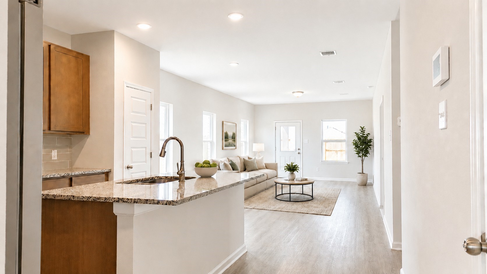 1929 North Riverside Circle Dayton, TX 77535 - Photo 9 of 21 Virtually Staged Kitchen-This virtually staged living room highlights the home’s open-concept design, abundant natural light, and comfortable layout—perfect for relaxing or entertaining guests.