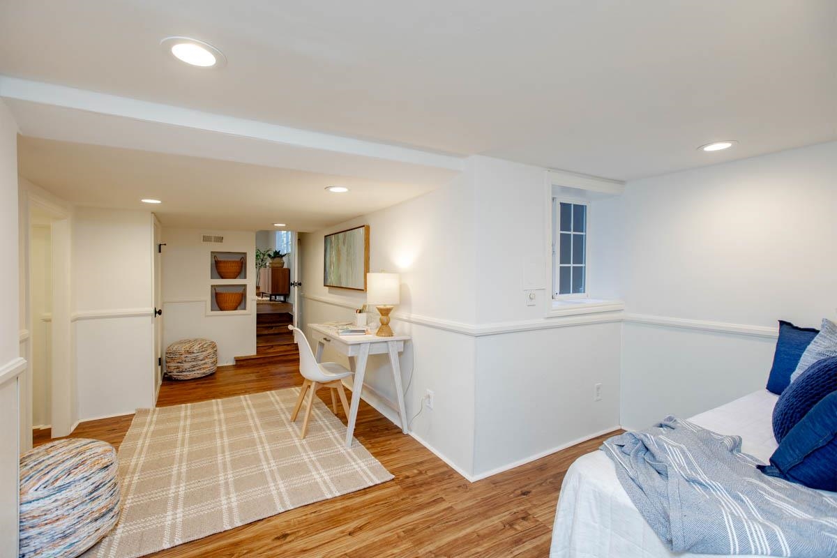 1427 Bay Street Alameda, CA 94501 - Photo 31 of 60 a living room with furniture and a table