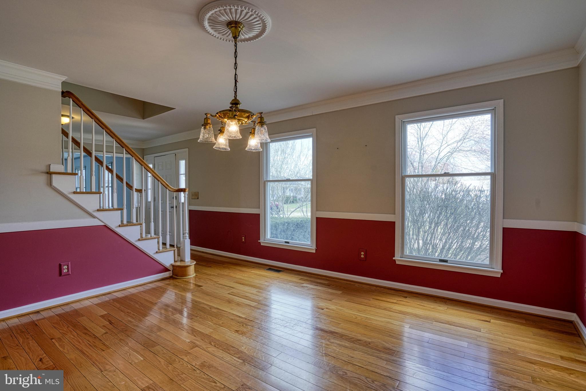 200 Spring Drive Easton, MD 21601 - Photo 11 of 54 a view of entryway and hall with wooden floor