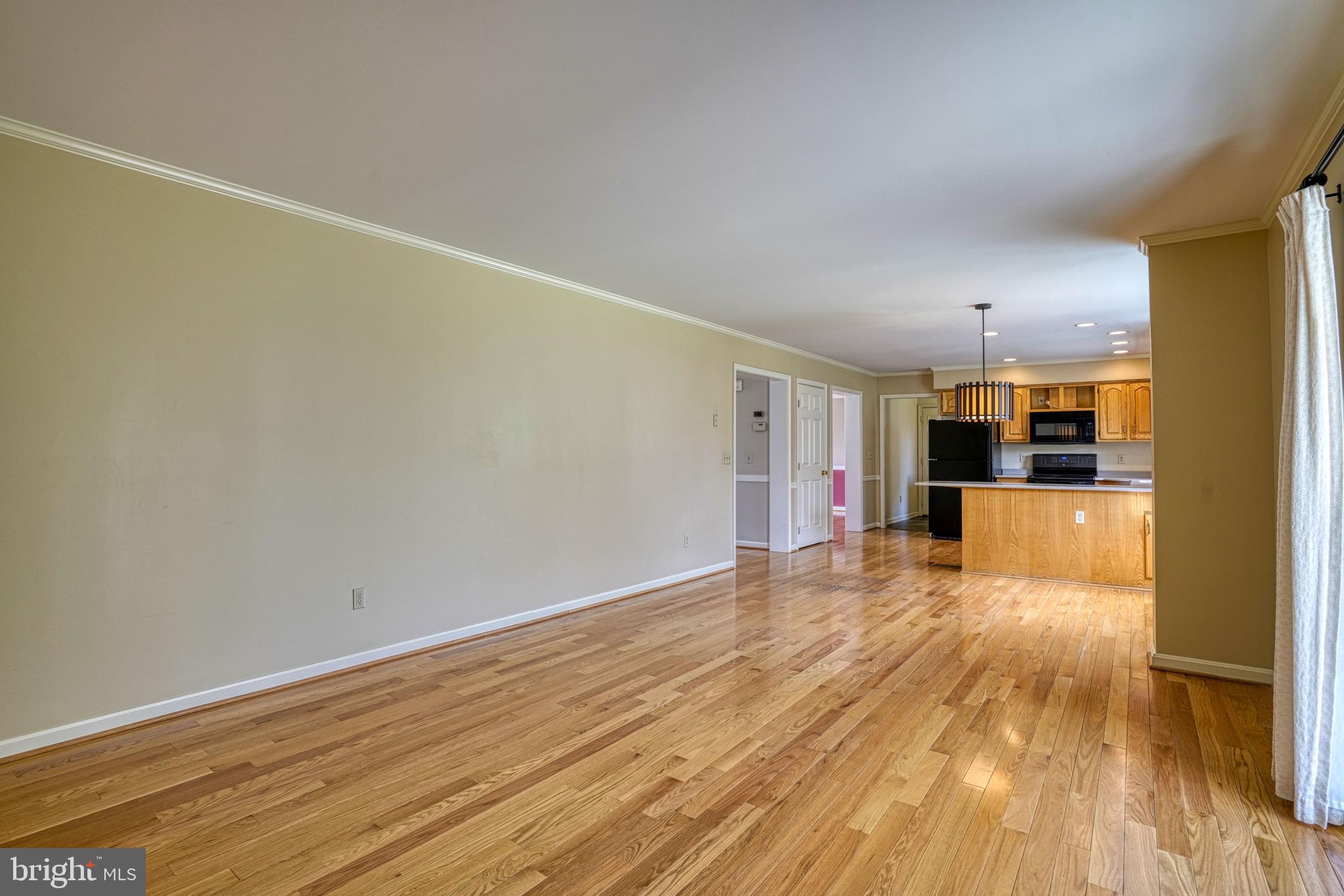 200 Spring Drive Easton, MD 21601 - Photo 19 of 54 a view of empty room with wooden floor