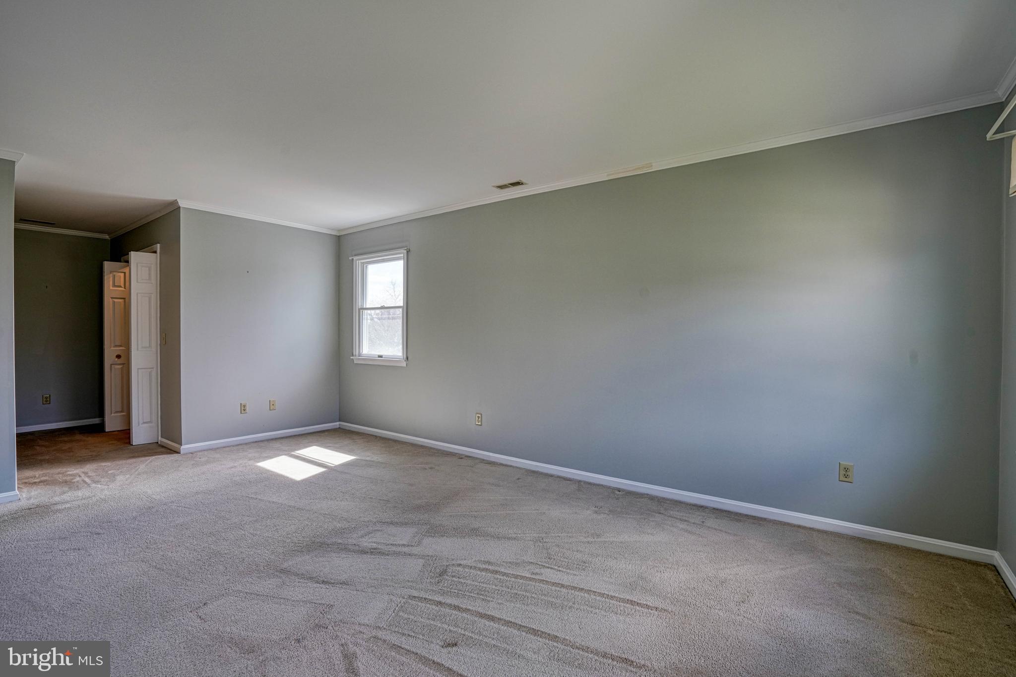 200 Spring Drive Easton, MD 21601 - Photo 32 of 54 an empty room with windows