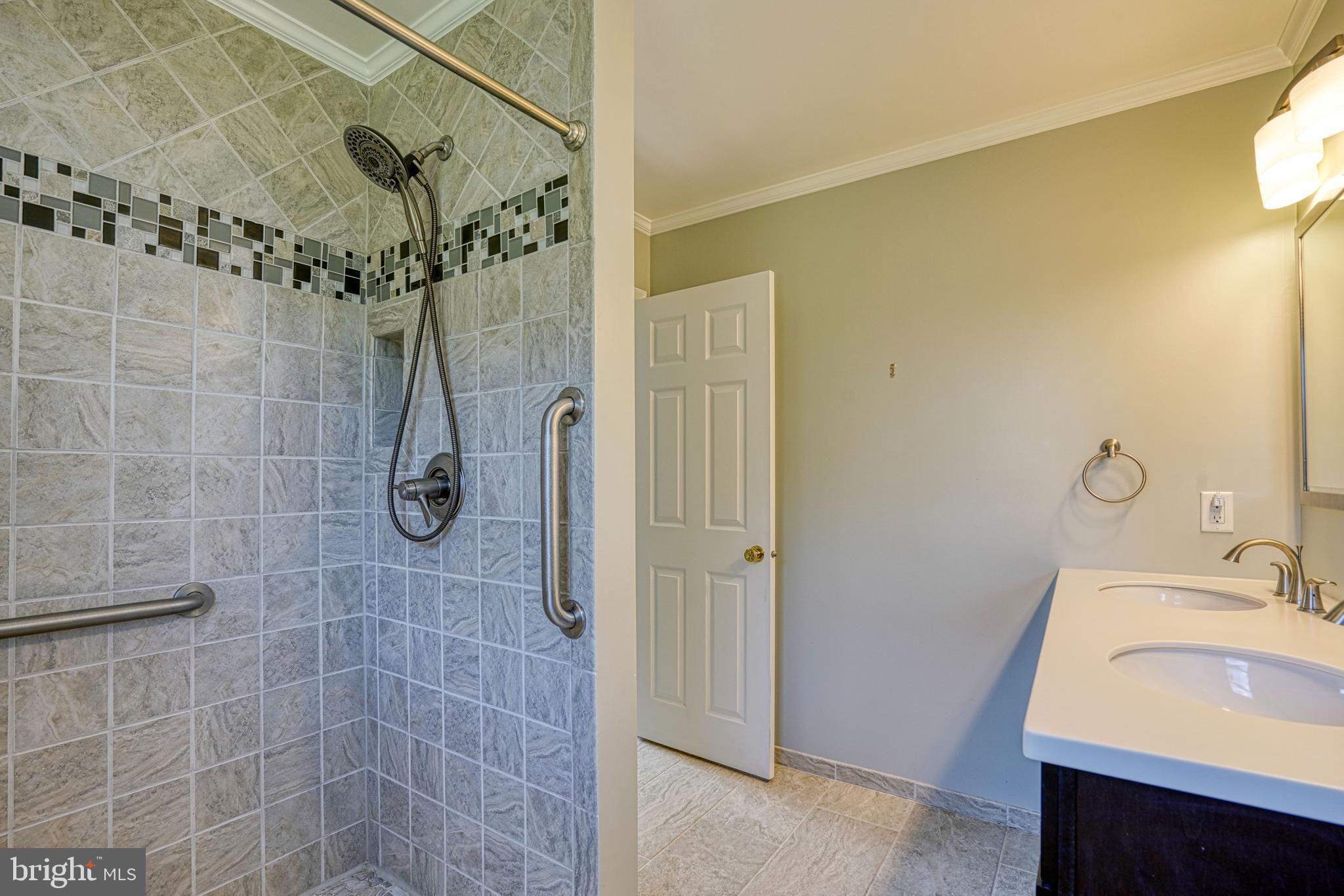 200 Spring Drive Easton, MD 21601 - Photo 33 of 54 a bathroom with a sink and shower