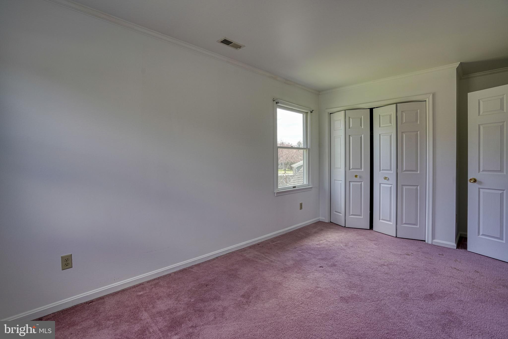 200 Spring Drive Easton, MD 21601 - Photo 41 of 54 an empty room with windows