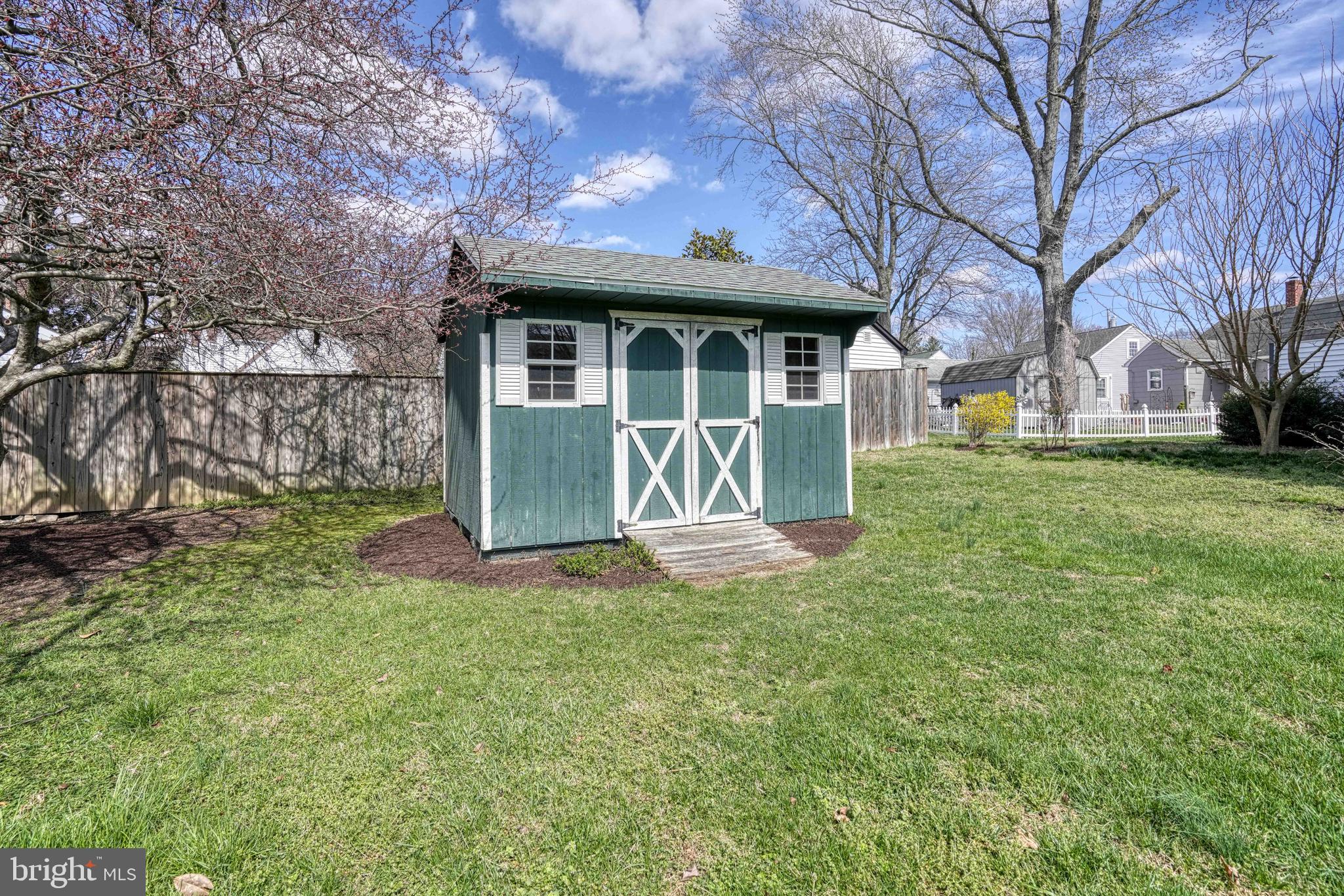 200 Spring Drive Easton, MD 21601 - Photo 52 of 54 a view of a house with a yard
