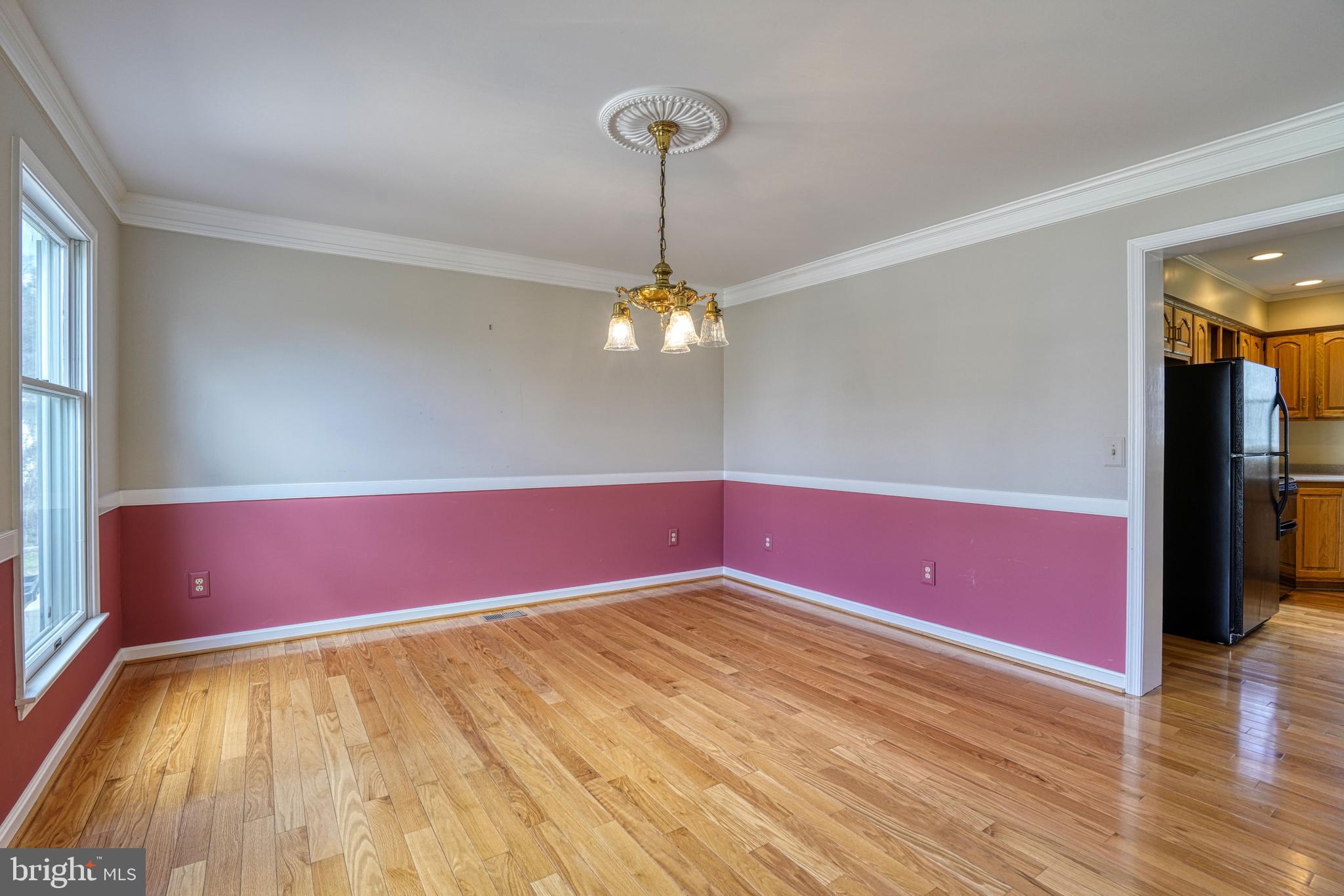 200 Spring Drive Easton, MD 21601 - Photo 9 of 54 a view of empty room with wooden floor