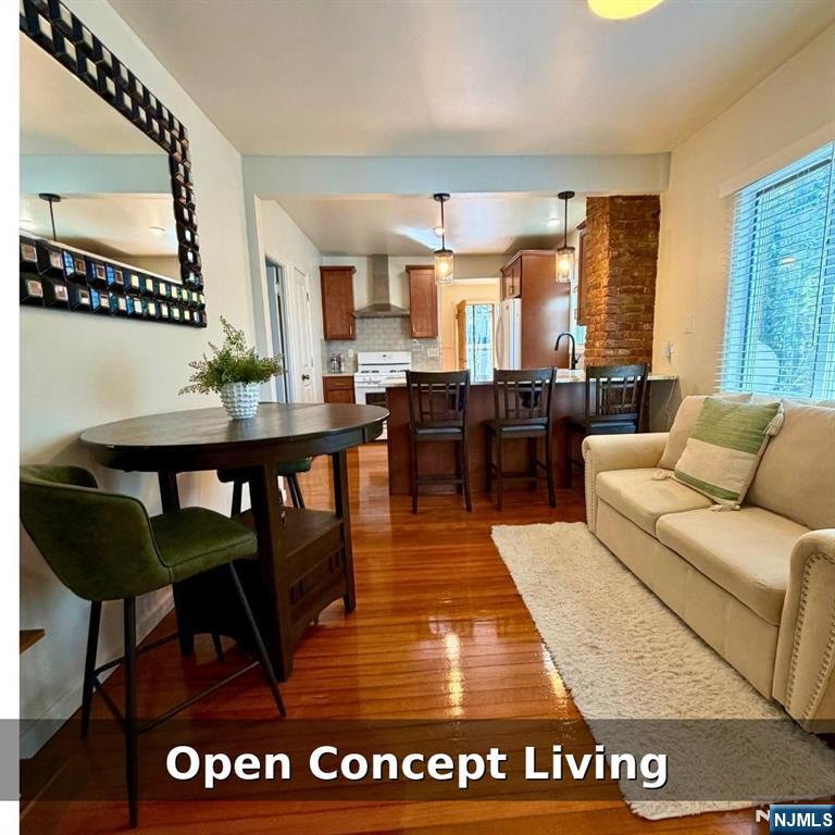 10 Fairview Place Bloomfield, NJ 07003 - Photo 2 of 20 a living room with furniture wooden floor and a large window