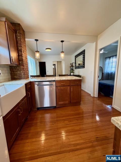 10 Fairview Place Bloomfield, NJ 07003 - Photo 5 of 20 a kitchen with stainless steel appliances granite countertop a sink and a stove top oven