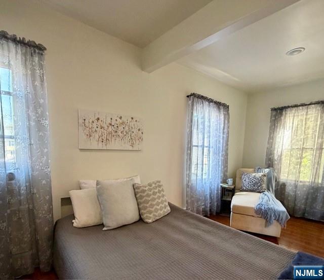 10 Fairview Place Bloomfield, NJ 07003 - Photo 9 of 20 a bedroom with a bed and window