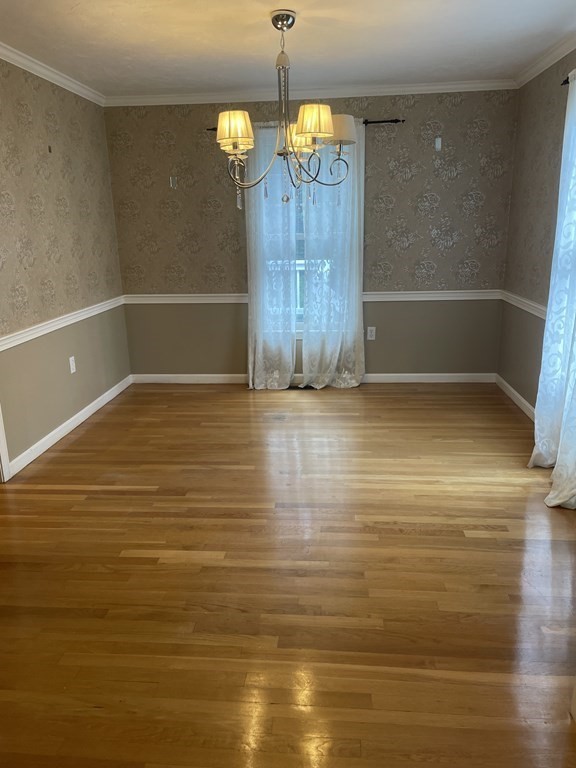 25 Upson Road Wellesley, MA 02482 - Photo 6 of 32 a view of a room with wooden floor