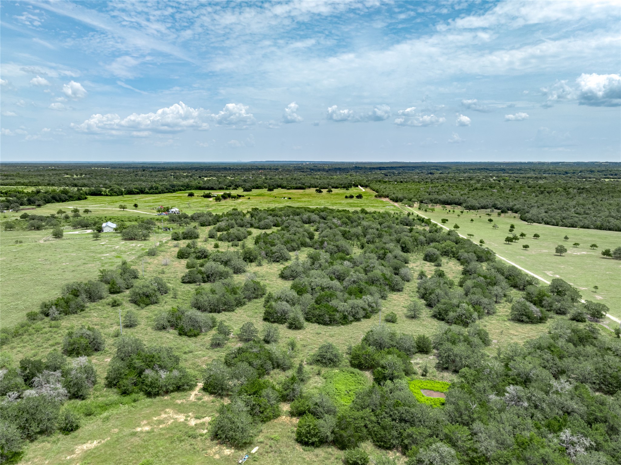 1345 Davis Road Muldoon, TX 78949 - Photo 23 of 25 a view of a large green field