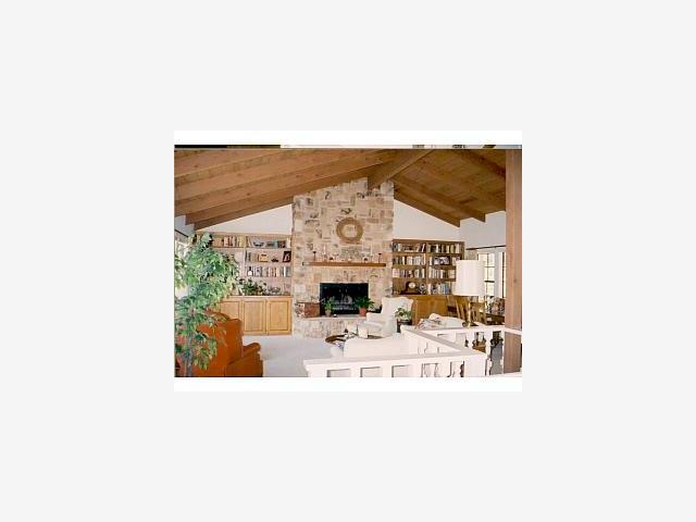 3058 Lopez Road Pebble Beach, CA 93953 - Photo 3 of 4 a picture of a living room with a fireplace