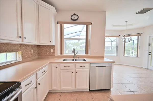 $565,000 | 4646 Pointe O Woods Drive, Wesley Chapel, FL 33543