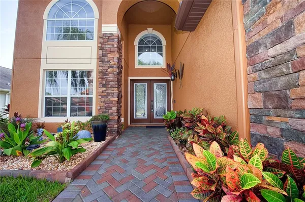 $565,000 | 4646 Pointe O Woods Drive, Wesley Chapel, FL 33543