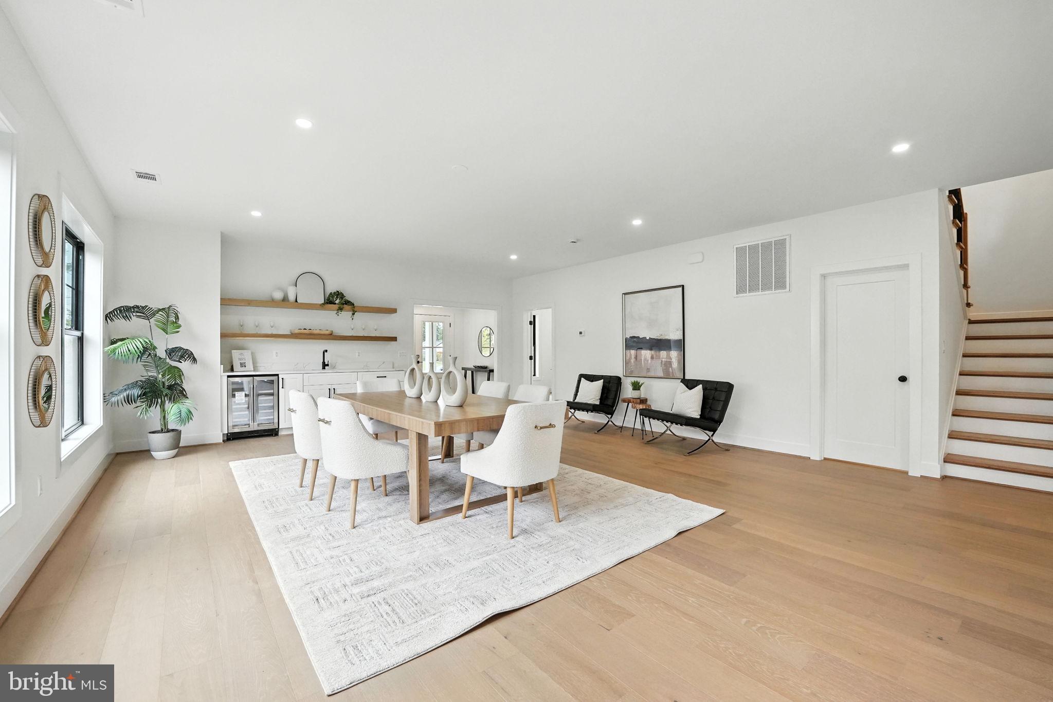 8118 Drayton Lane Springfield, VA 22151 - Photo 13 of 71 a view of a dining room with furniture window and wooden floor