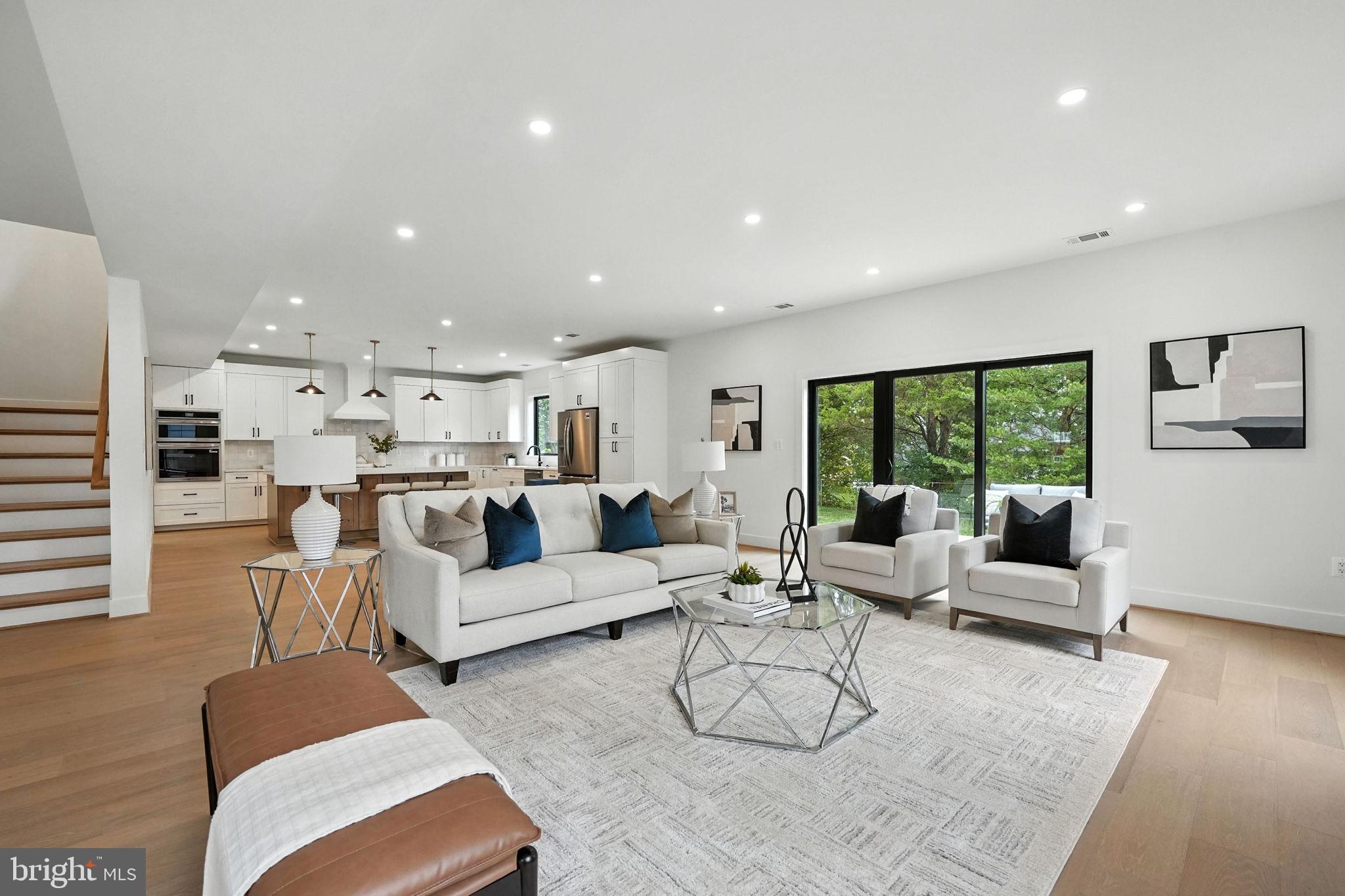 8118 Drayton Lane Springfield, VA 22151 - Photo 16 of 71 a living room with furniture and a large window