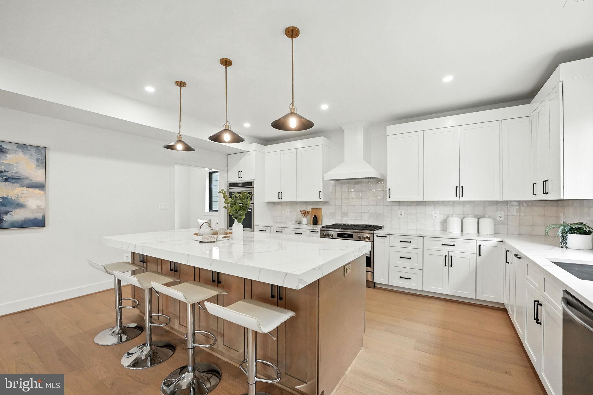 8118 Drayton Lane Springfield, VA 22151 - Photo 21 of 71 a kitchen with a table and chairs in it