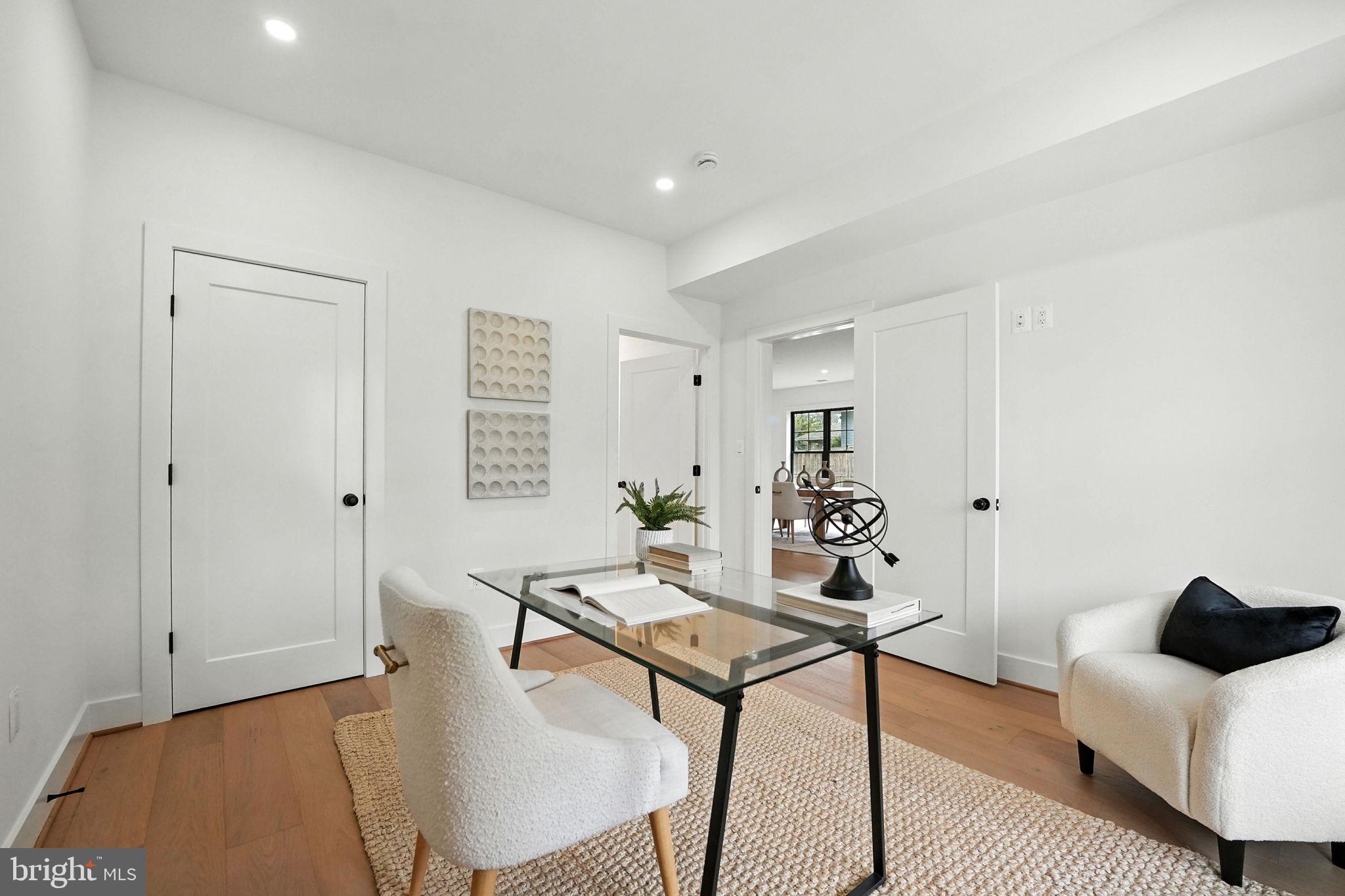 8118 Drayton Lane Springfield, VA 22151 - Photo 29 of 71 a living room with furniture and wooden floor
