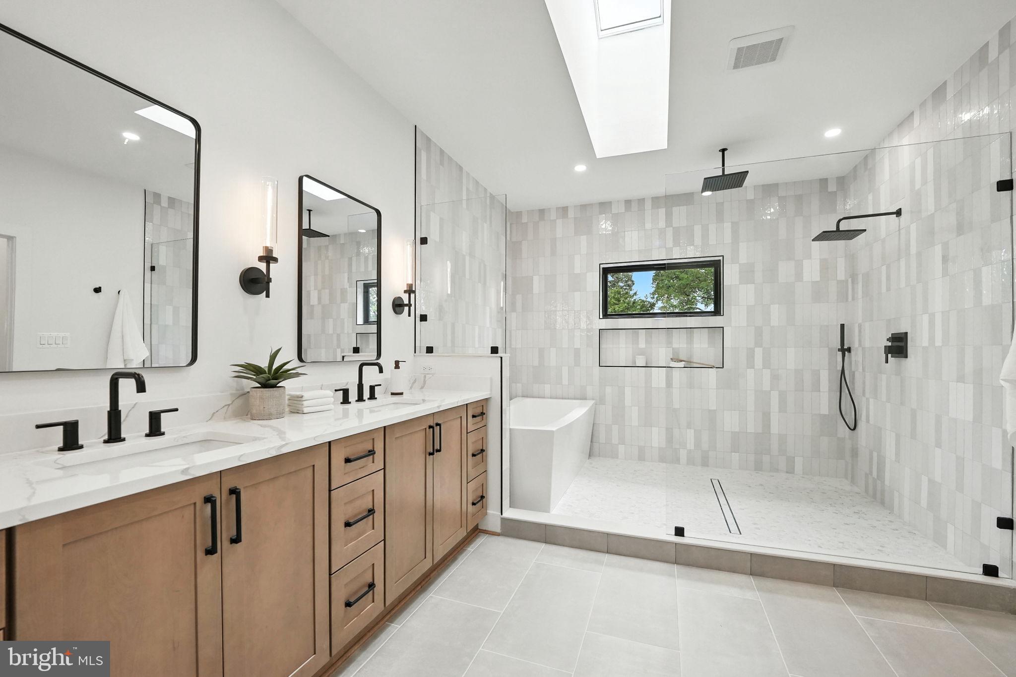 8118 Drayton Lane Springfield, VA 22151 - Photo 44 of 71 a bathroom with a double vanity sink mirror and shower