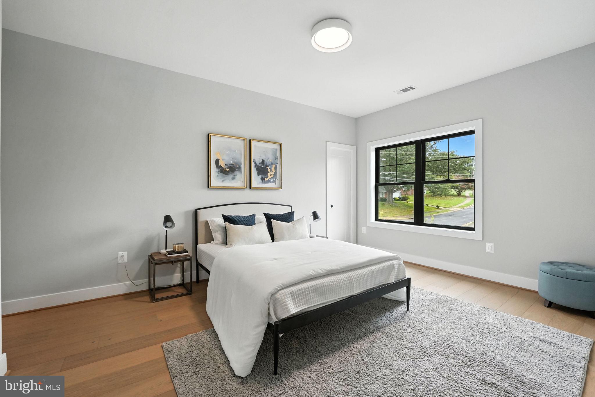 8118 Drayton Lane Springfield, VA 22151 - Photo 54 of 71 a bedroom with a bed and a window