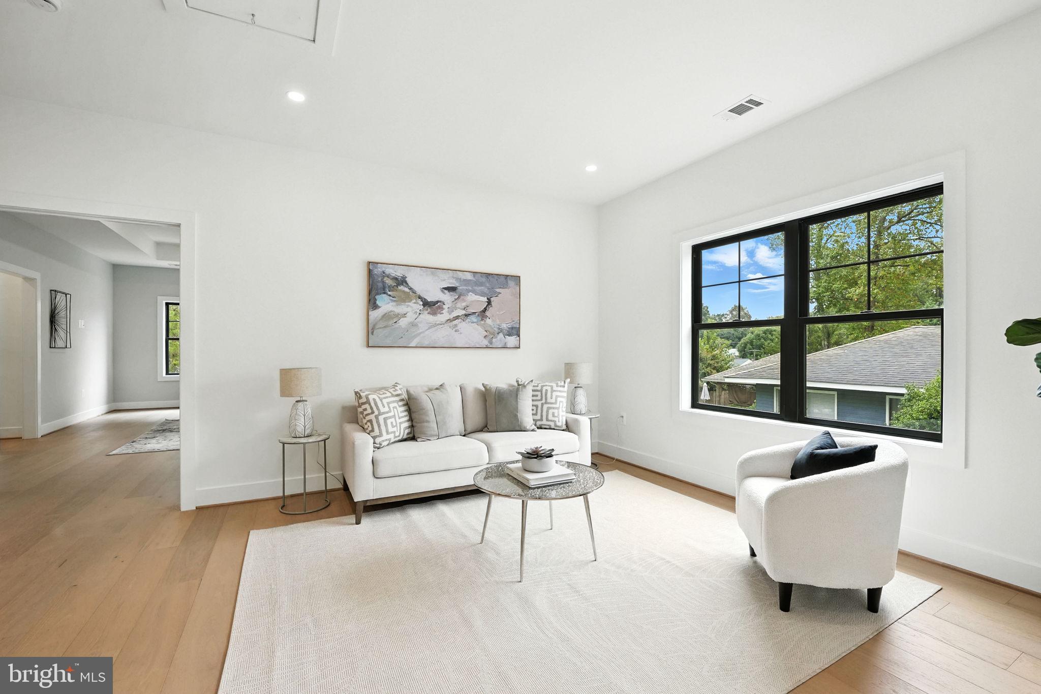 8118 Drayton Lane Springfield, VA 22151 - Photo 60 of 71 a living room with furniture and a large window