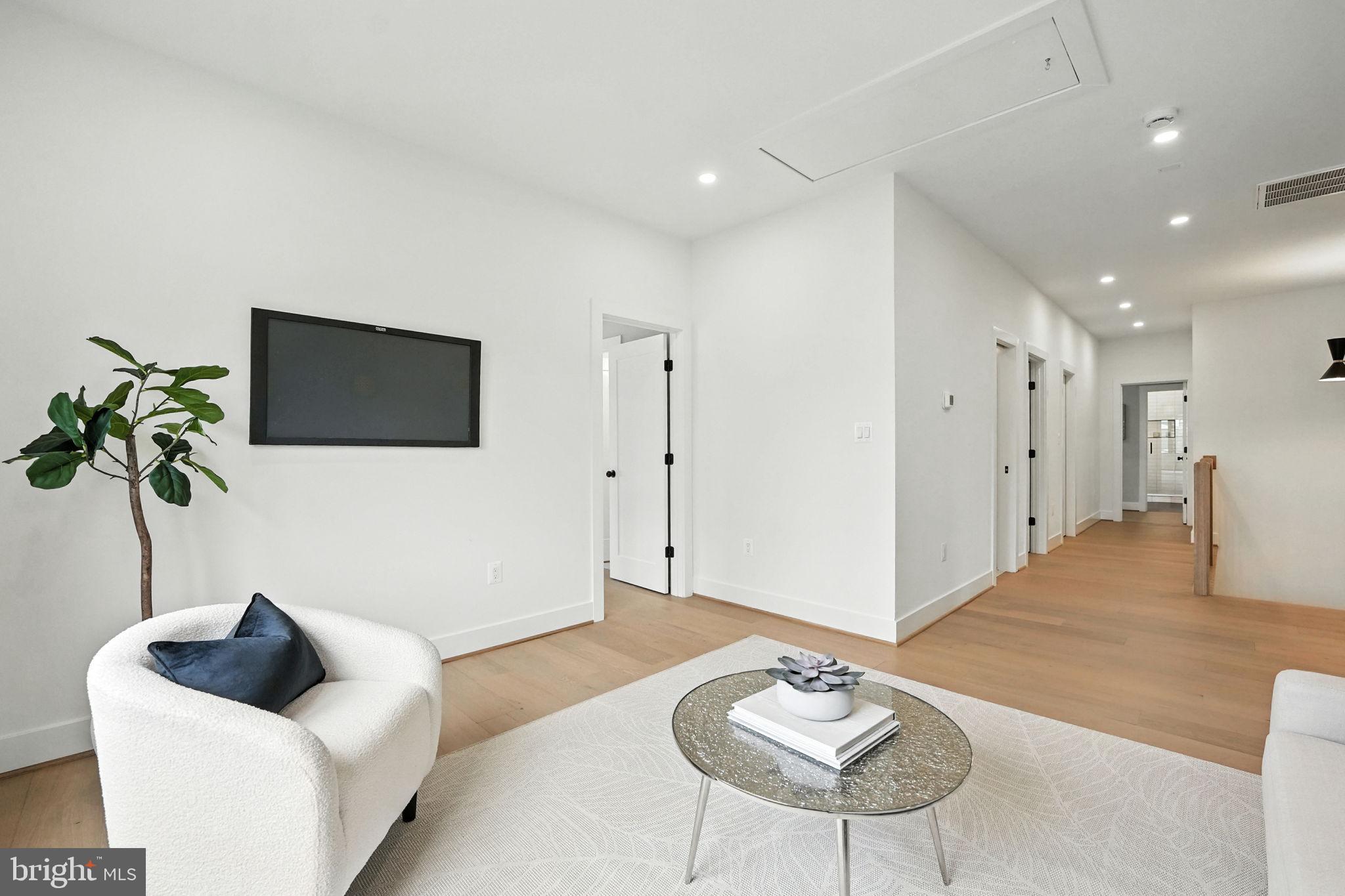 8118 Drayton Lane Springfield, VA 22151 - Photo 61 of 71 a living room with furniture and a flat screen tv