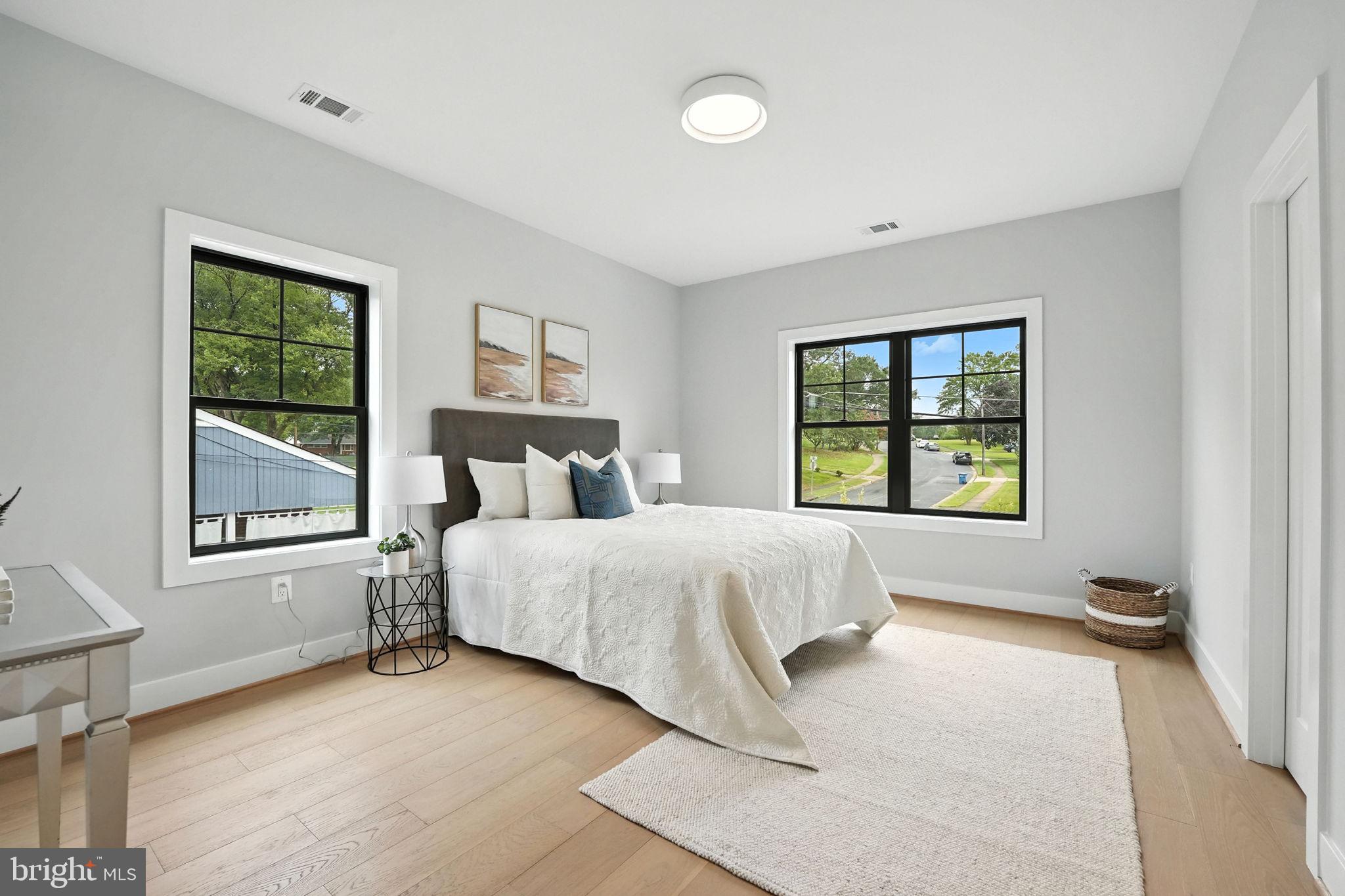 8118 Drayton Lane Springfield, VA 22151 - Photo 62 of 71 a bedroom with a bed and a window