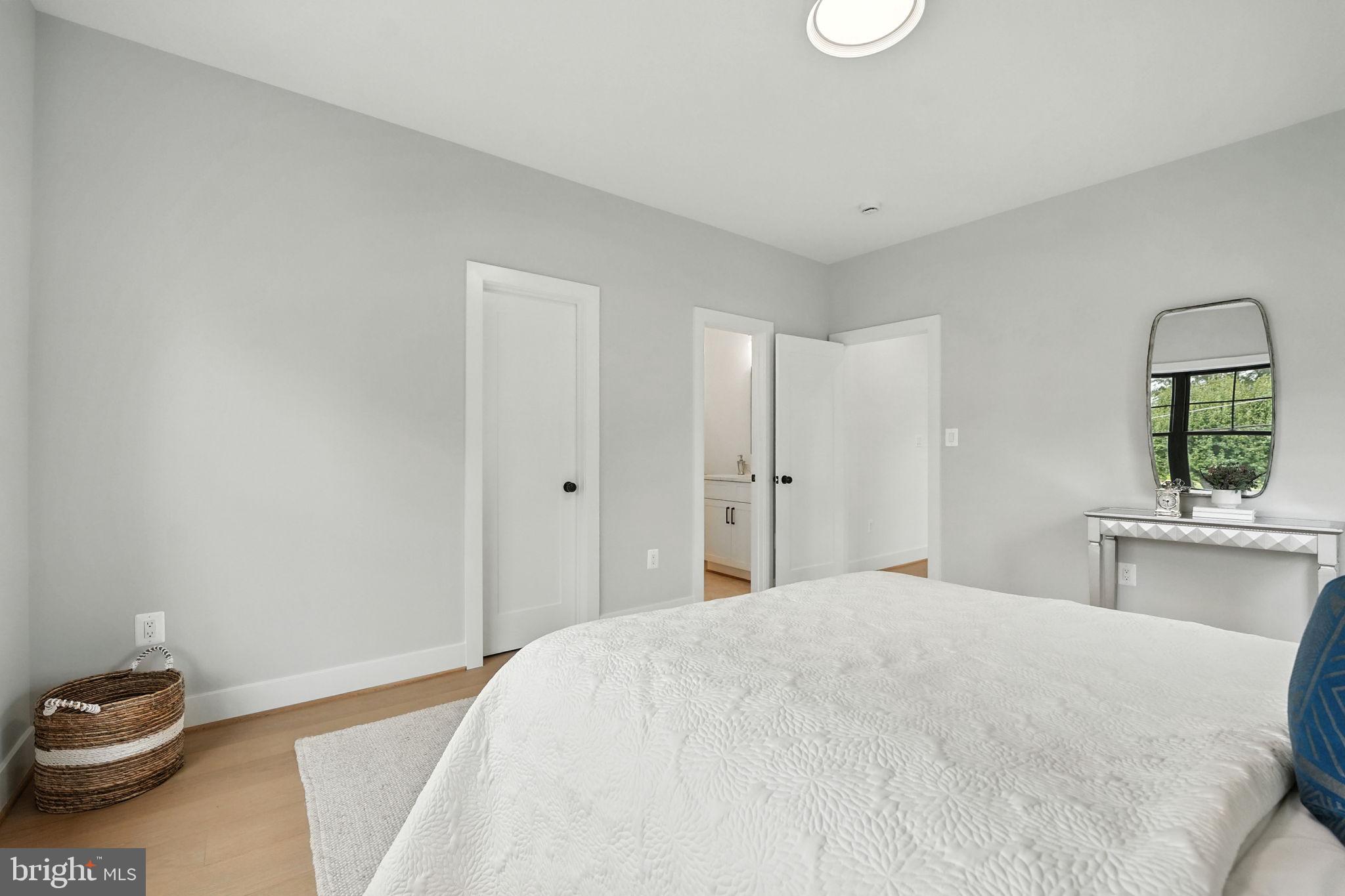 8118 Drayton Lane Springfield, VA 22151 - Photo 63 of 71 a bedroom with a bed and a window