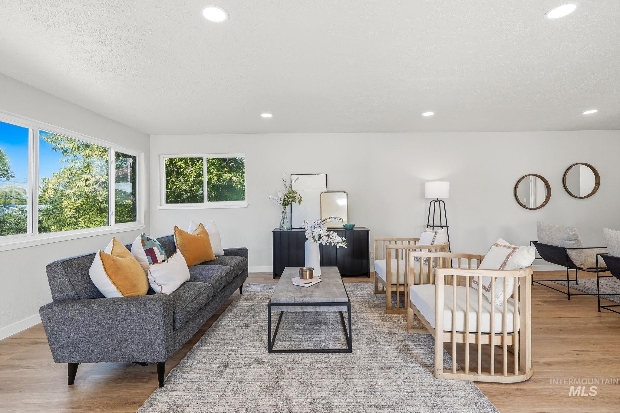 1990 Panama Street Boise, ID 83705 - Photo 10 of 50 Bright living space featuring wood-finish flooring, recessed lighting, and white walls