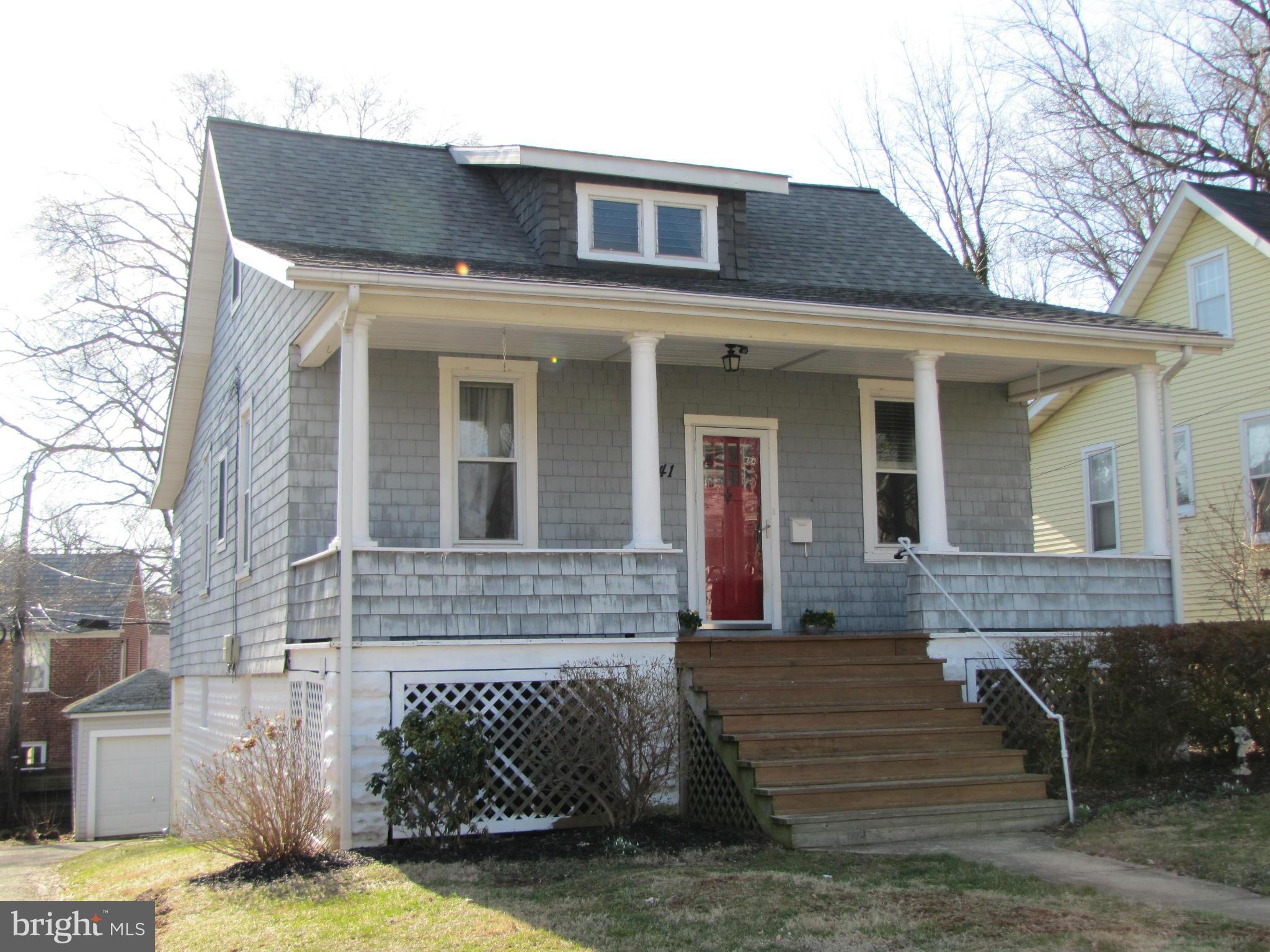41 Edmondson Ridge Road Baltimore, MD 21228 - Photo 1 of 30 a front view of a house with a yard