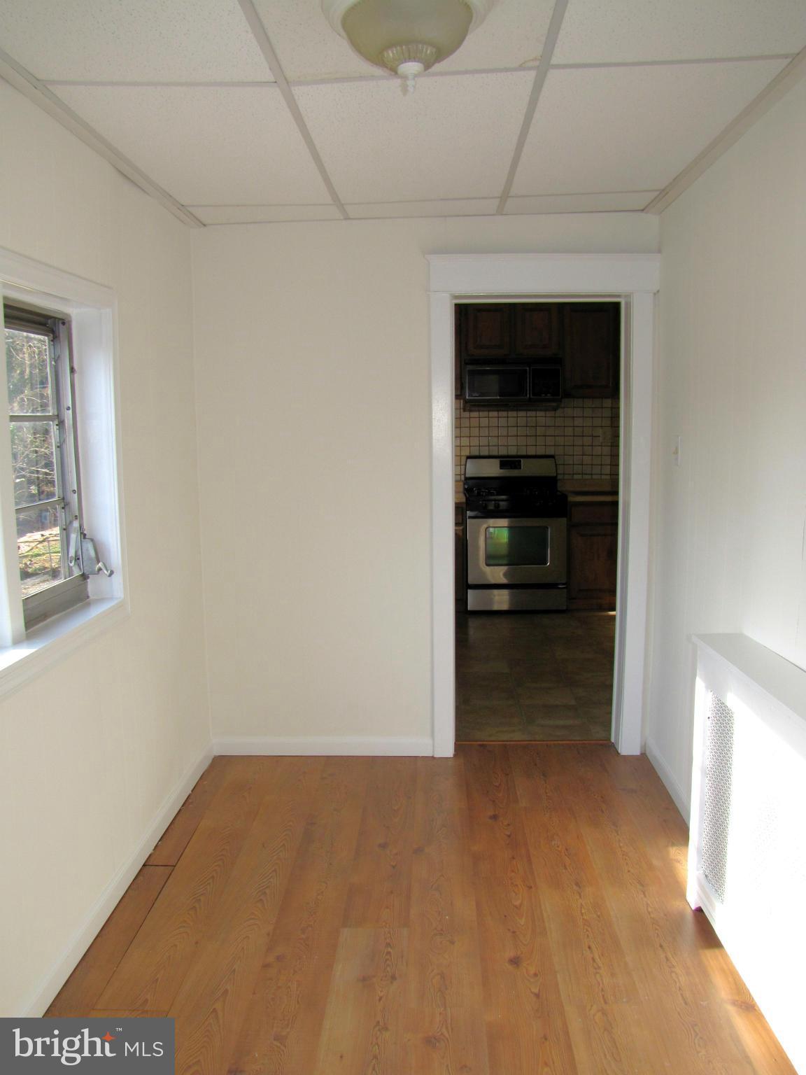 41 Edmondson Ridge Road Baltimore, MD 21228 - Photo 13 of 30 a view of empty room with a fireplace