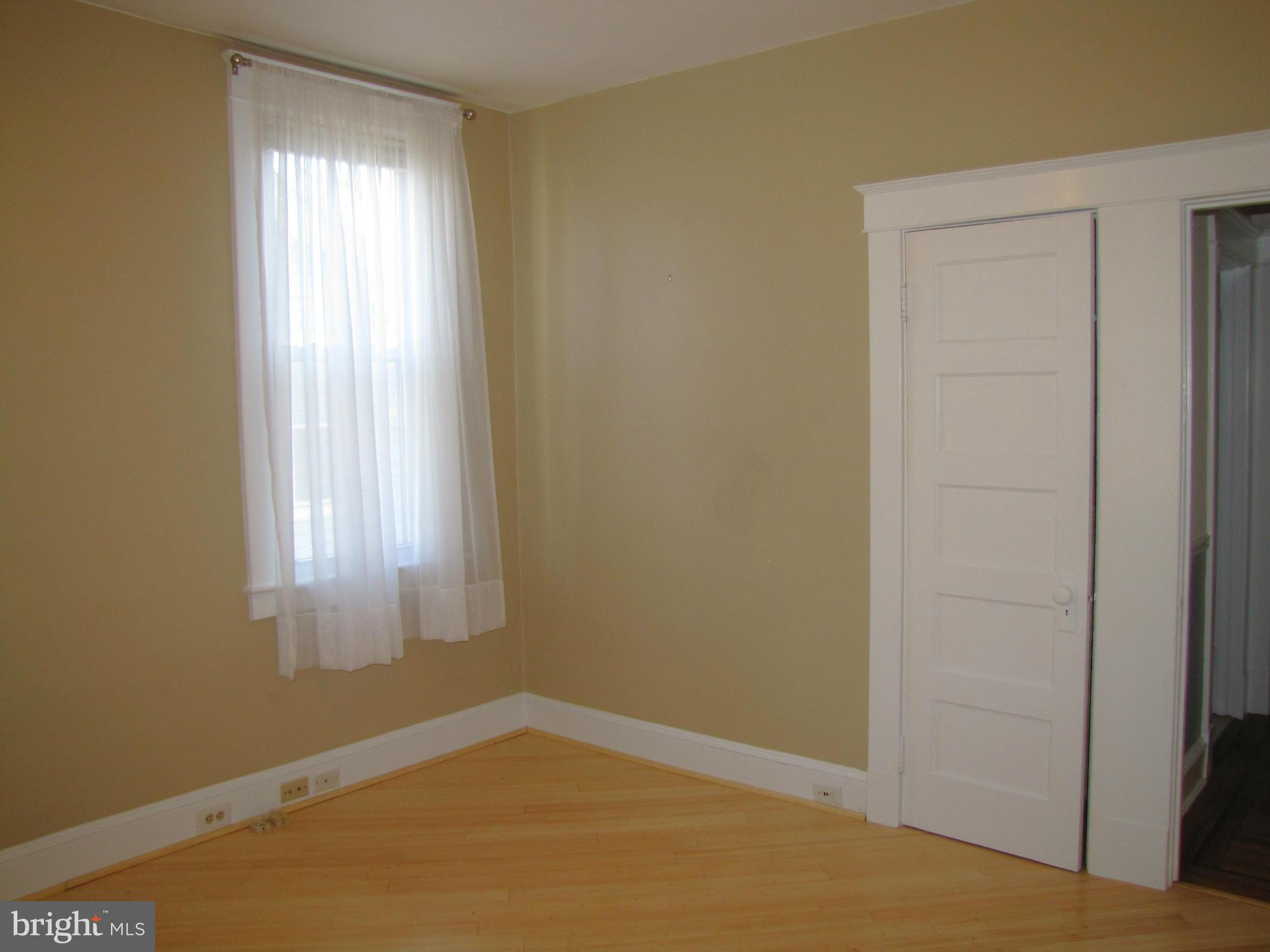 41 Edmondson Ridge Road Baltimore, MD 21228 - Photo 15 of 30 a view of an empty room and window