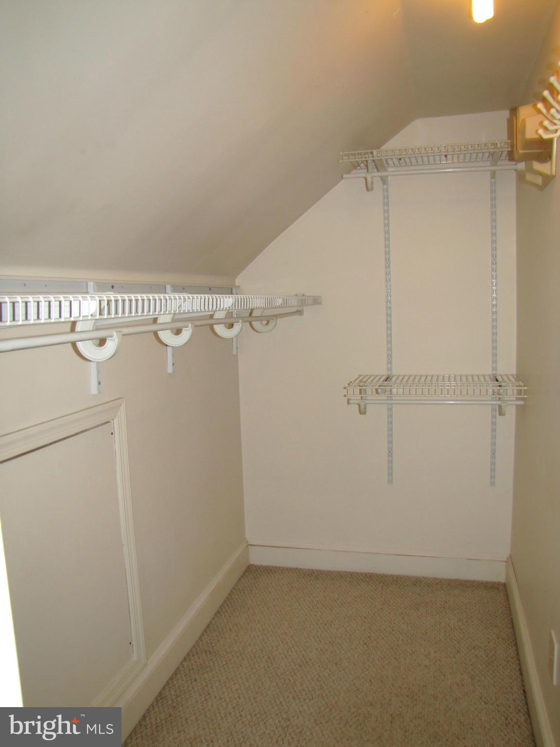 41 Edmondson Ridge Road Baltimore, MD 21228 - Photo 24 of 30 a view of a room with racks on the wall