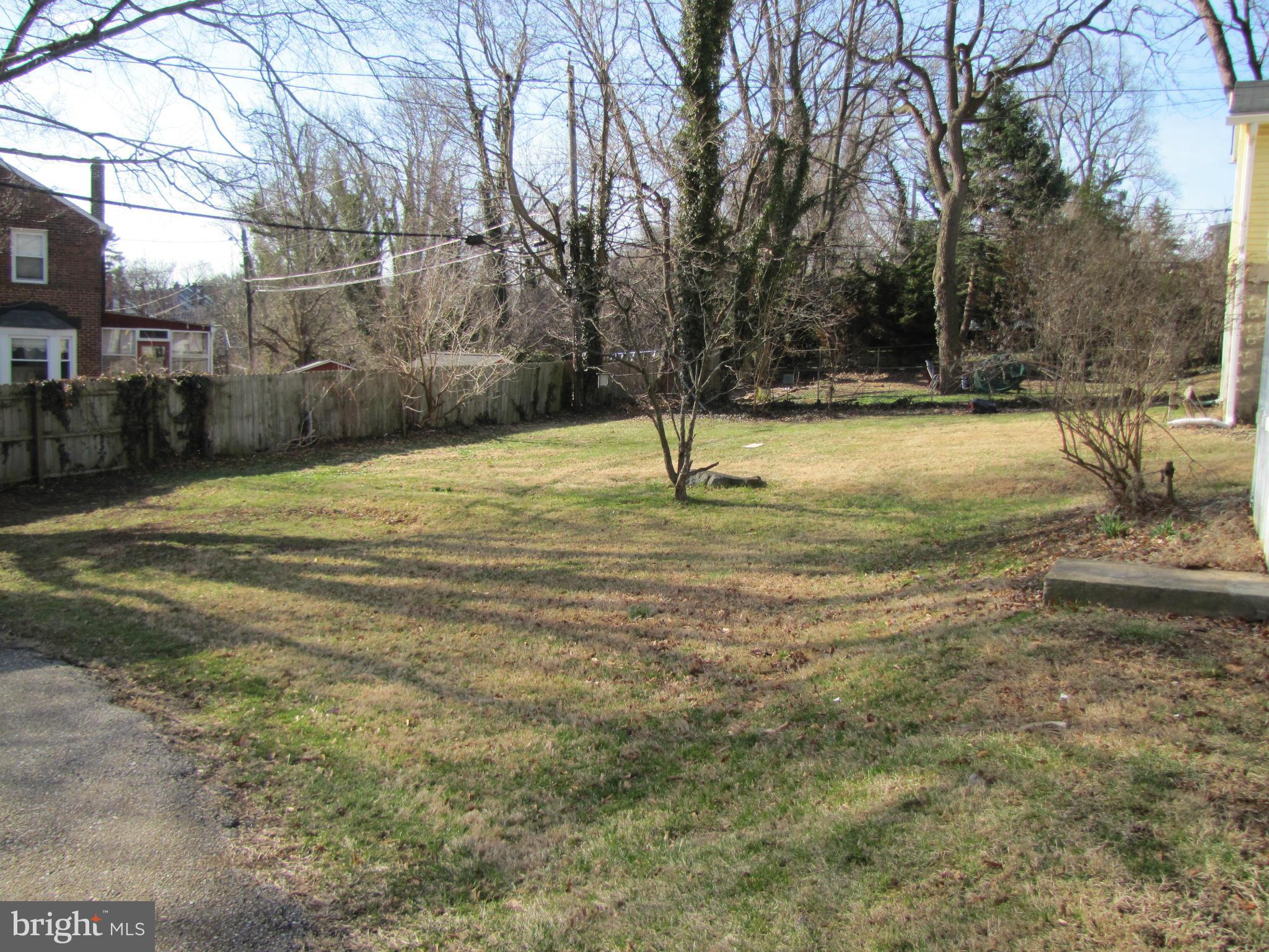 41 Edmondson Ridge Road Baltimore, MD 21228 - Photo 28 of 30 a house with trees in the background