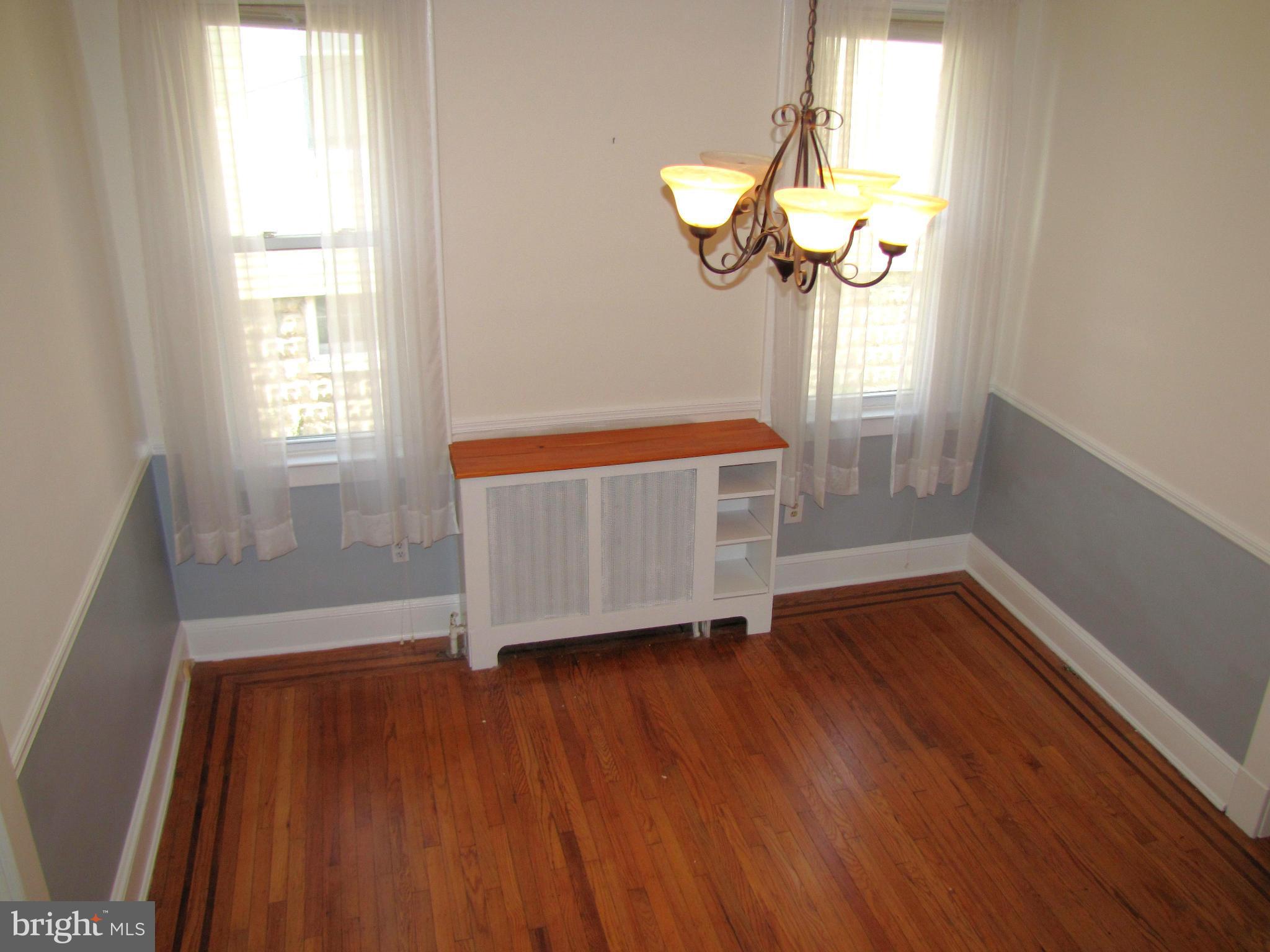 41 Edmondson Ridge Road Baltimore, MD 21228 - Photo 4 of 30 a view of empty room with wooden floor and fan