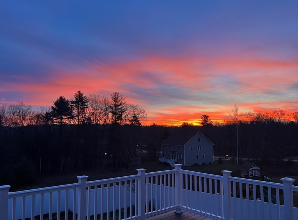 10 Schoolhouse Road, Unit 10 Londonderry, NH 03053 - Photo 37 of 38 a view of a city with sunset view
