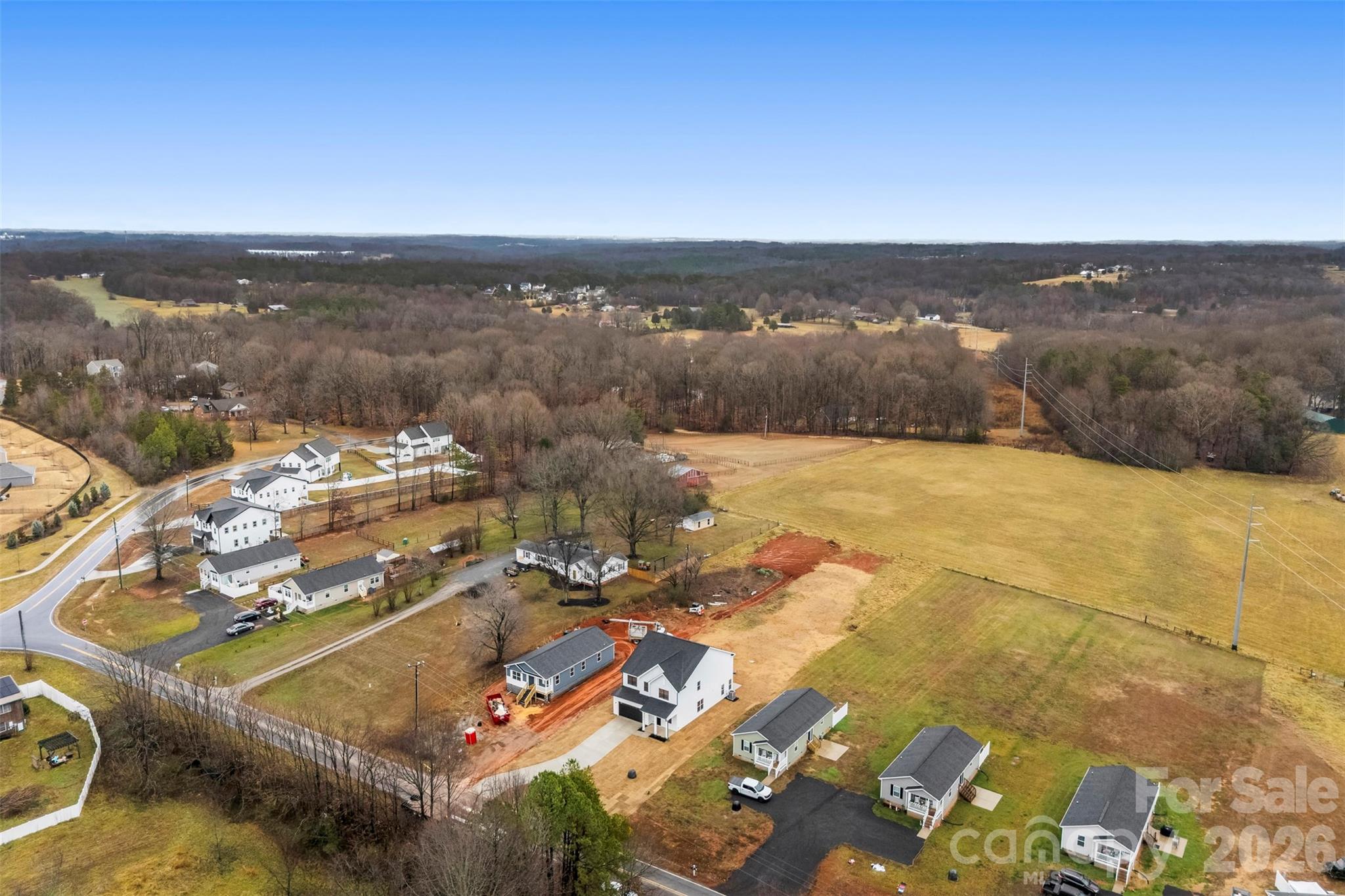 551 Perry Road Troutman, NC 28166 - Photo 44 of 47 an aerial view of residential houses with outdoor space