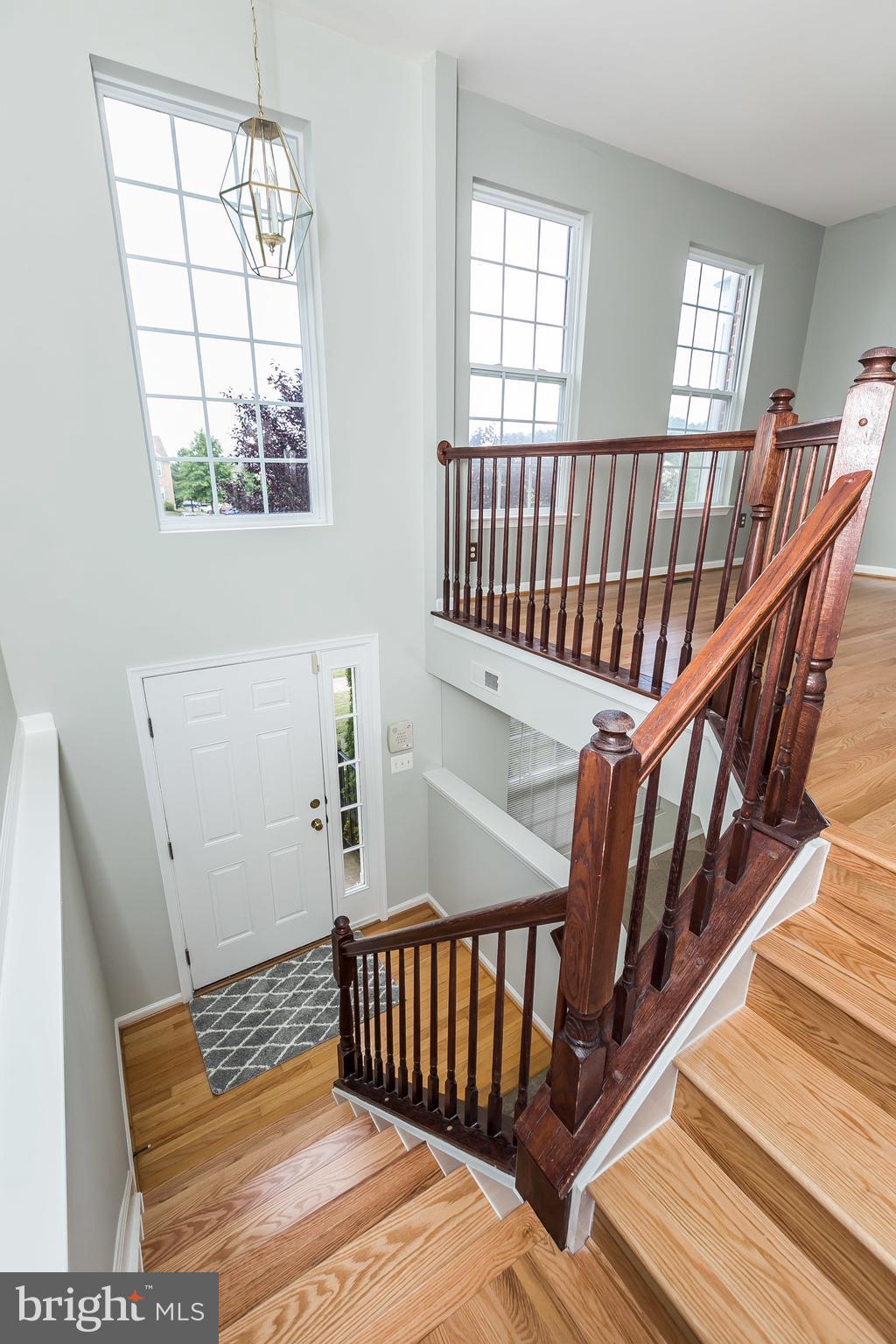 5059 Leasdale Road Rosedale, MD 21237 - Photo 3 of 30 2 story foyer w/new hardwwood stairs