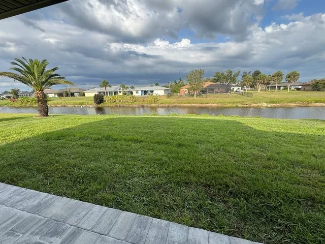 a view of a garden with houses