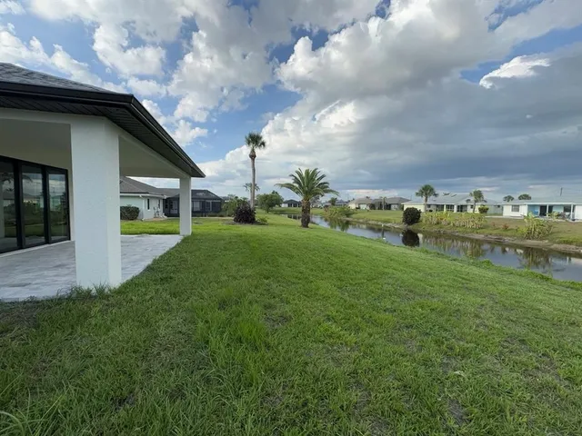 a view of a house with a big yard