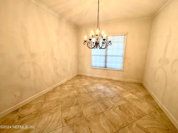 a view of a livingroom with a chandelier
